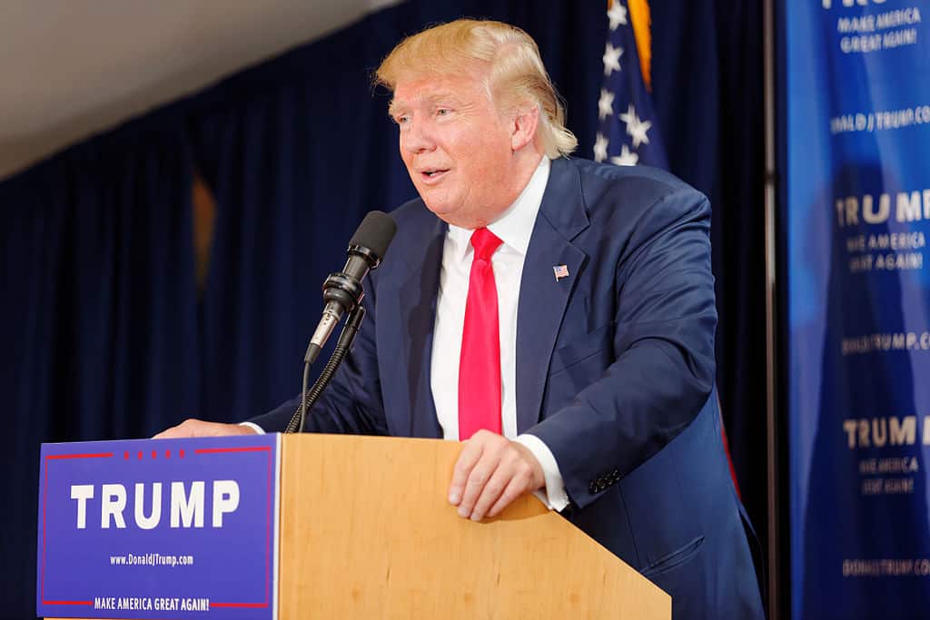 Trump speaking at a podium